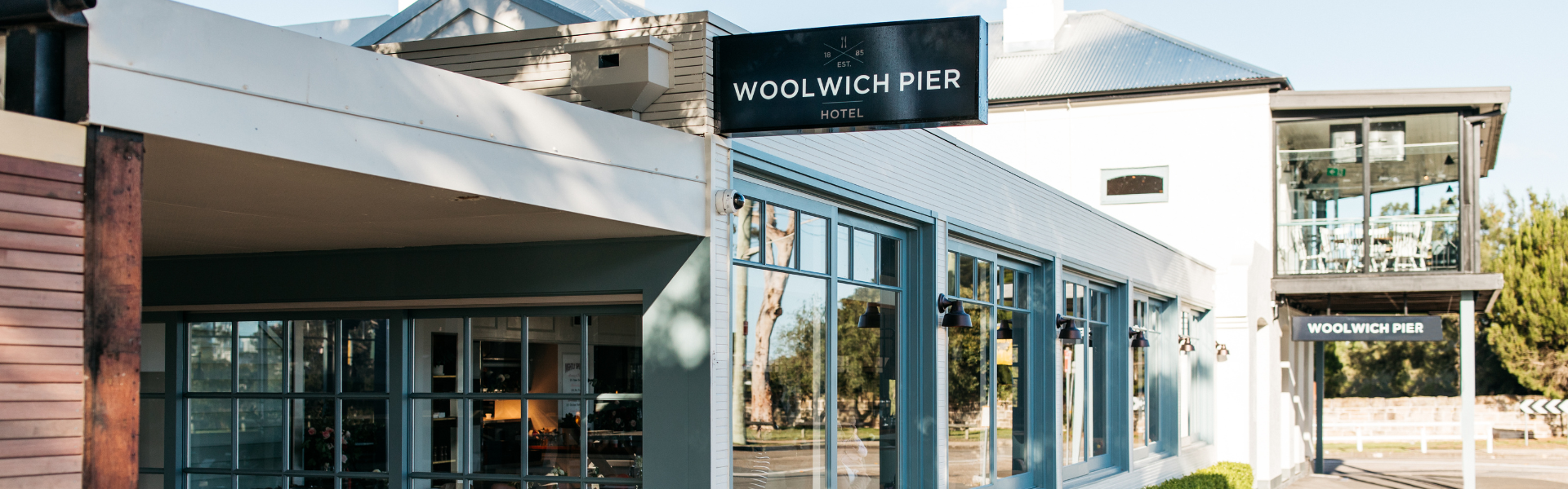 A view of the Woolwich Pier Hotel. Looking toward the main entrance from the Terrace entry.